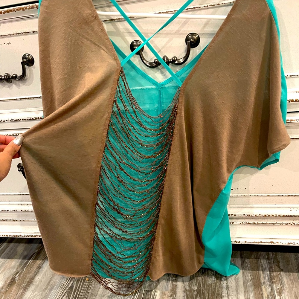 Top from buckle